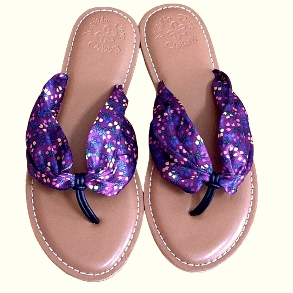 Matilda & Jane purple floral flip flops. Women’s size 7